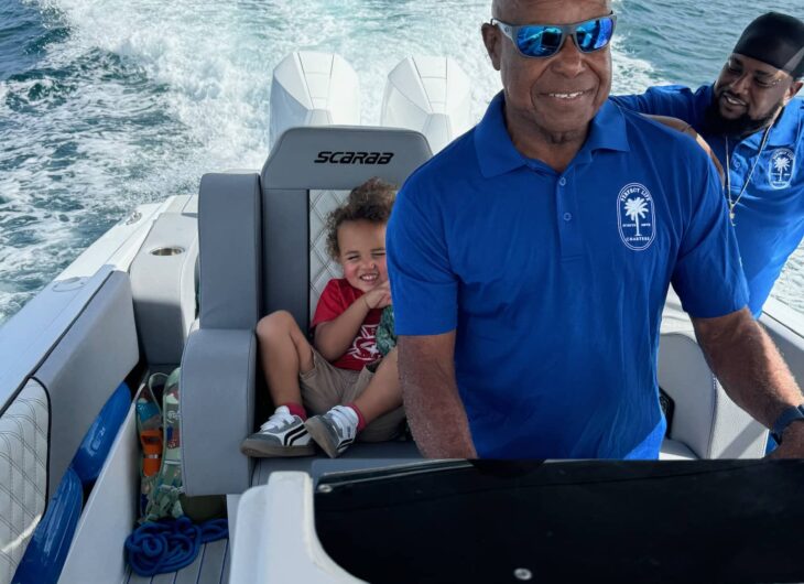 Captain John Cornelius navigating Perfect Life Charters’ Xplorer during a charter excursion in St. Kitts and Nevis.